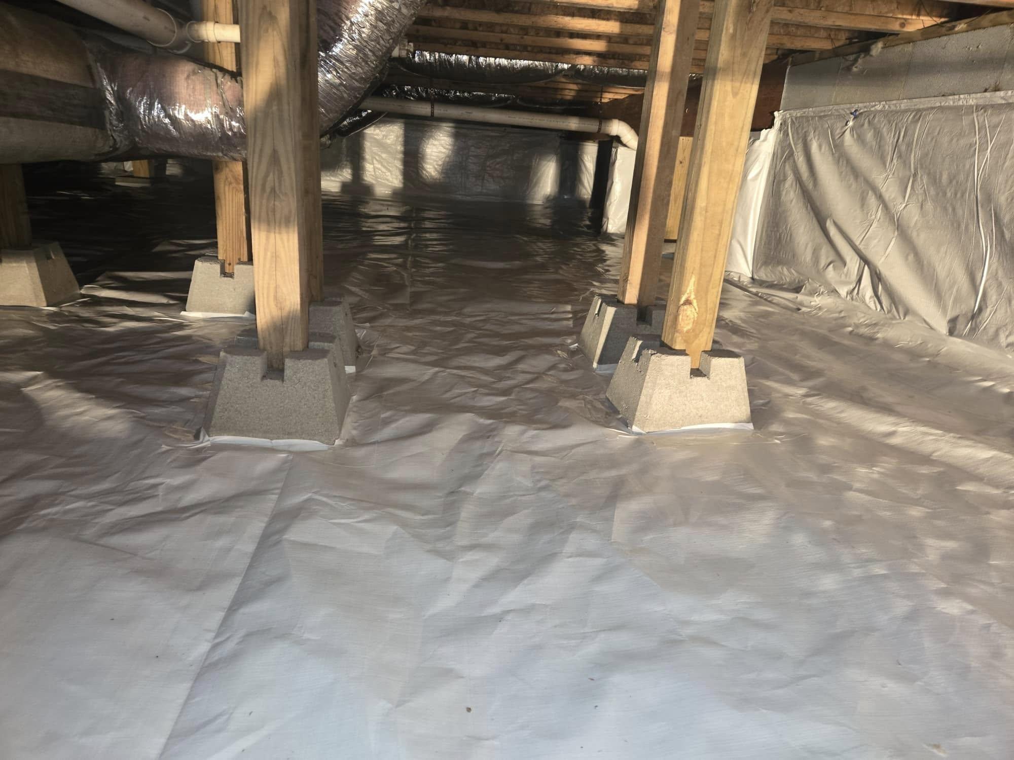 Sealed crawl space with a clean vapor barrier